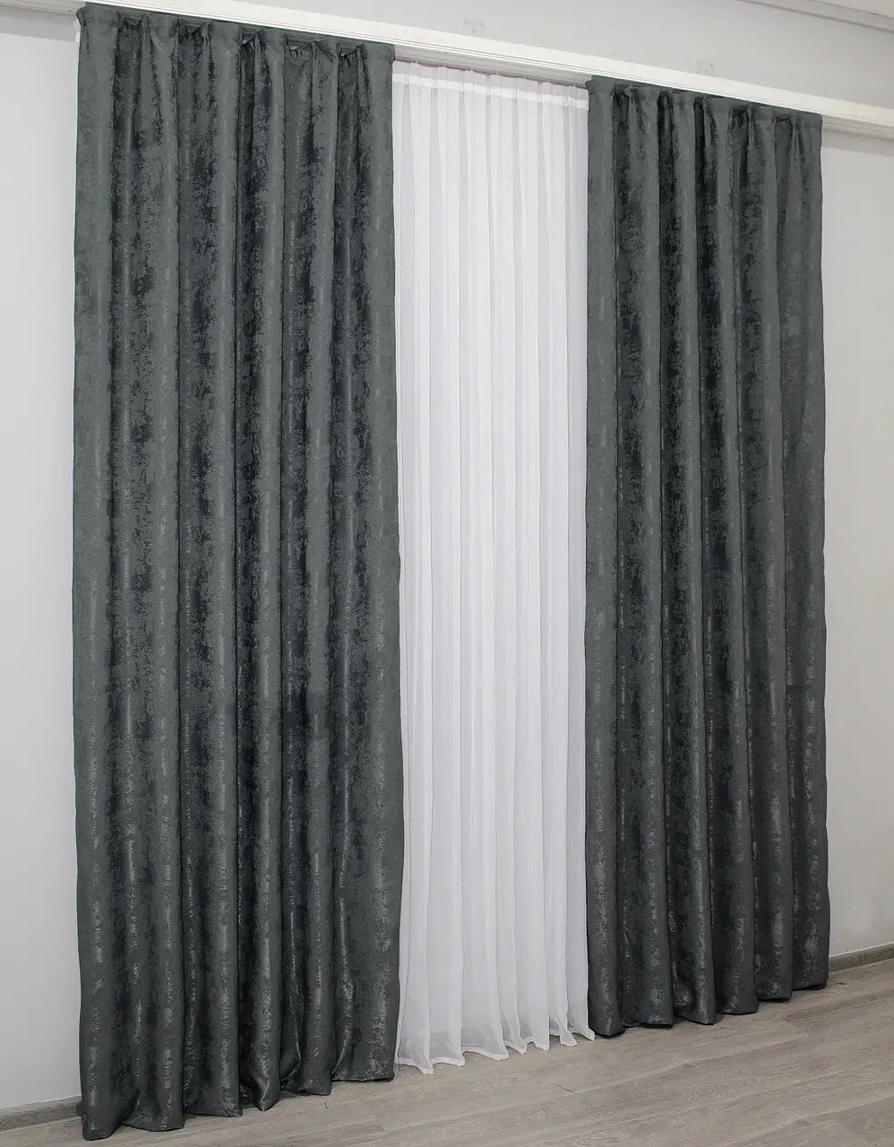 Premium light graphite grey curtains with 70% light filtering, balancing privacy and natural illumination in any space.
