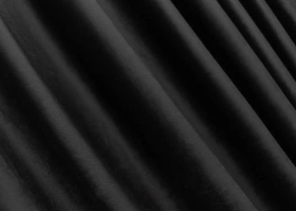 Shadow black velvet curtain panels, featuring noise-absorbing properties and a smooth finish.
