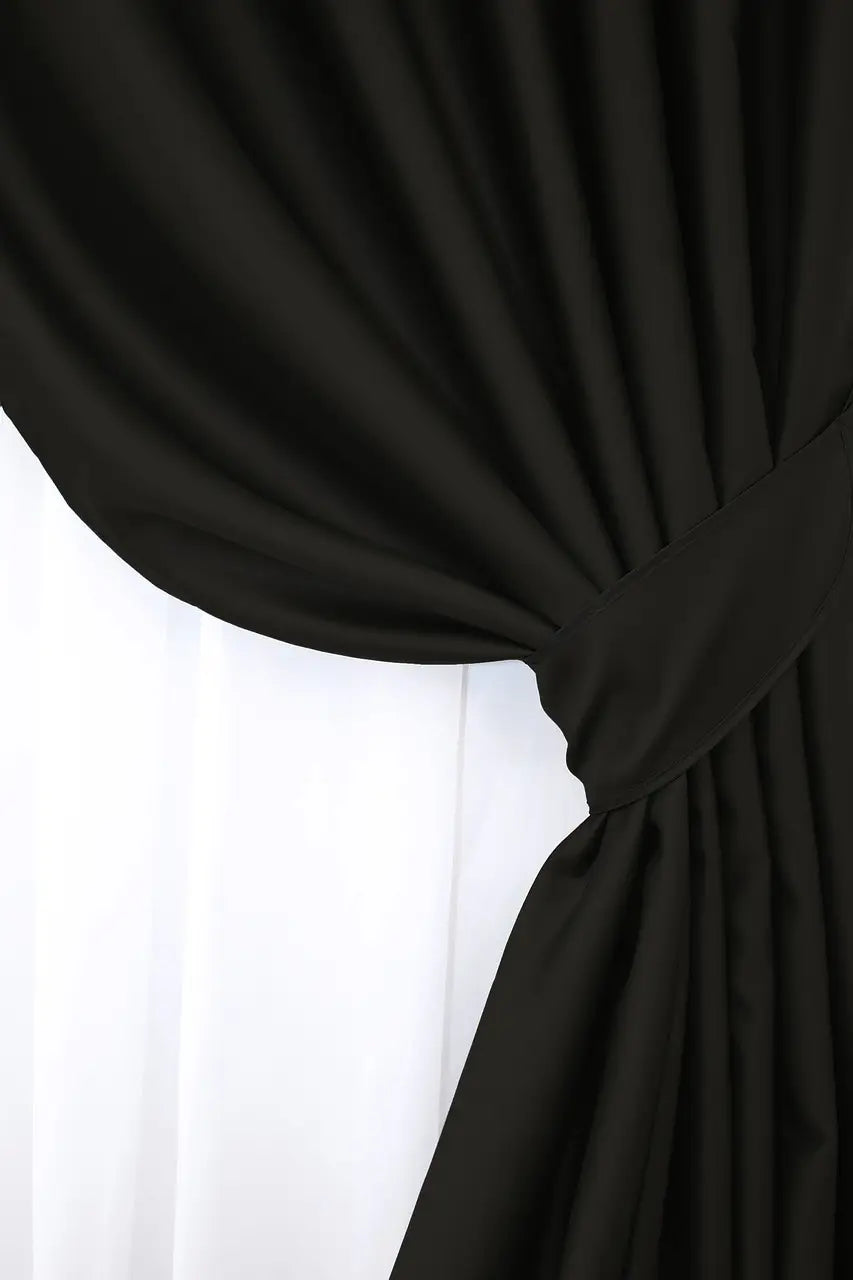 Shadow black blackout curtains with a modern aesthetic and soft texture.
