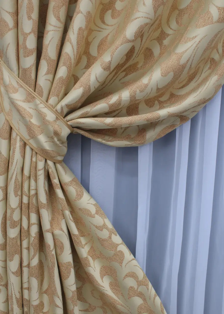 High-quality linen curtains in beige with a subtle decorative pattern for an elegant home touch.
