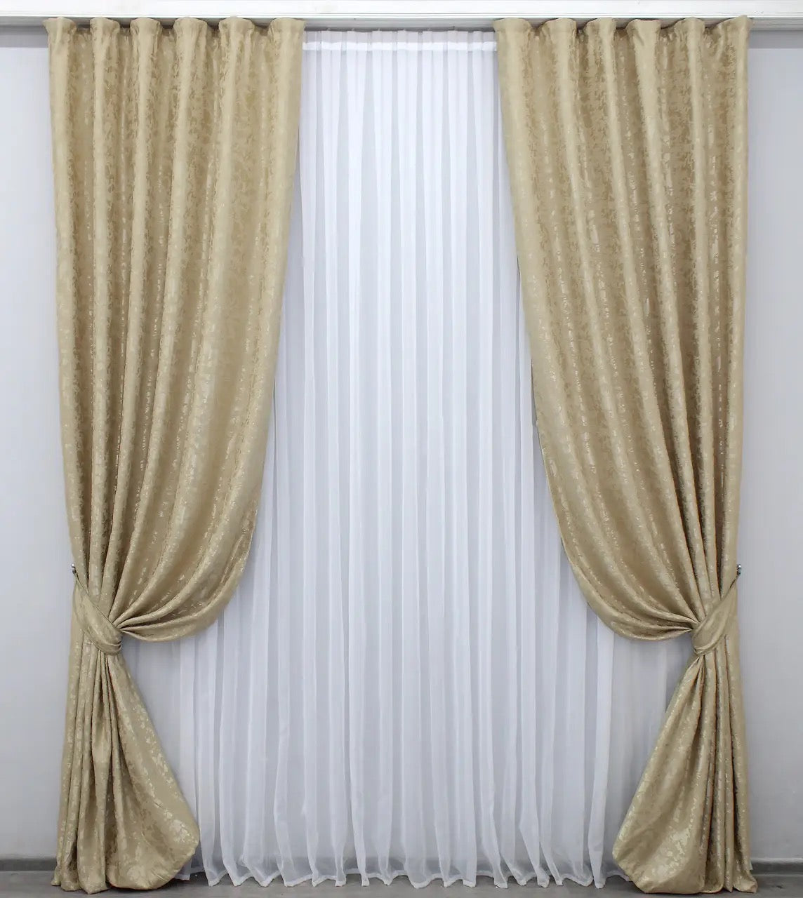 Soft beige linen drapes with a delicate marble texture, perfect for stylish and refined home decor.
