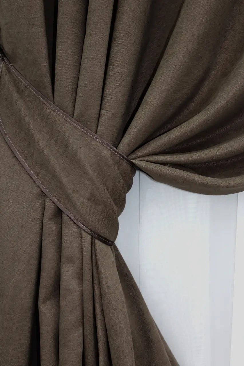 High-quality dark brown drapes with a stylish finish, complementing contemporary and classic interiors.
