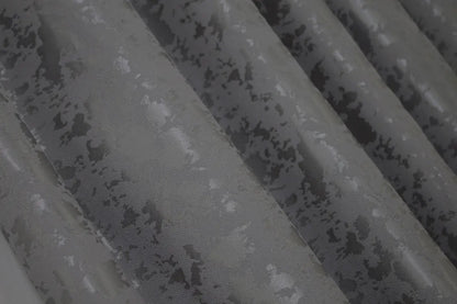 Soft grey linen drapes with a delicate marble texture, perfect for stylish and contemporary home decor.

