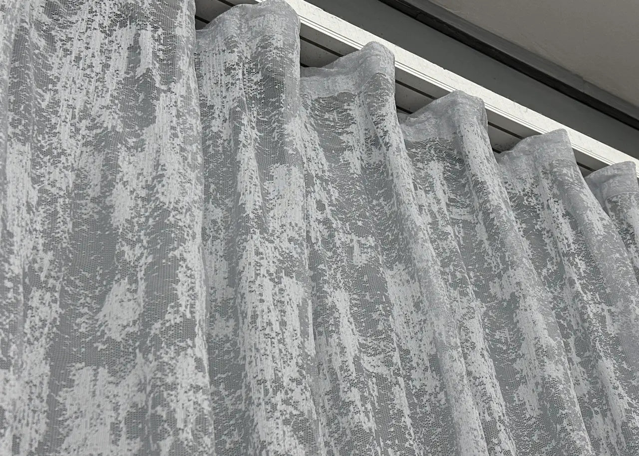 Soft grey sheer curtain – ideal for modern summer interiors