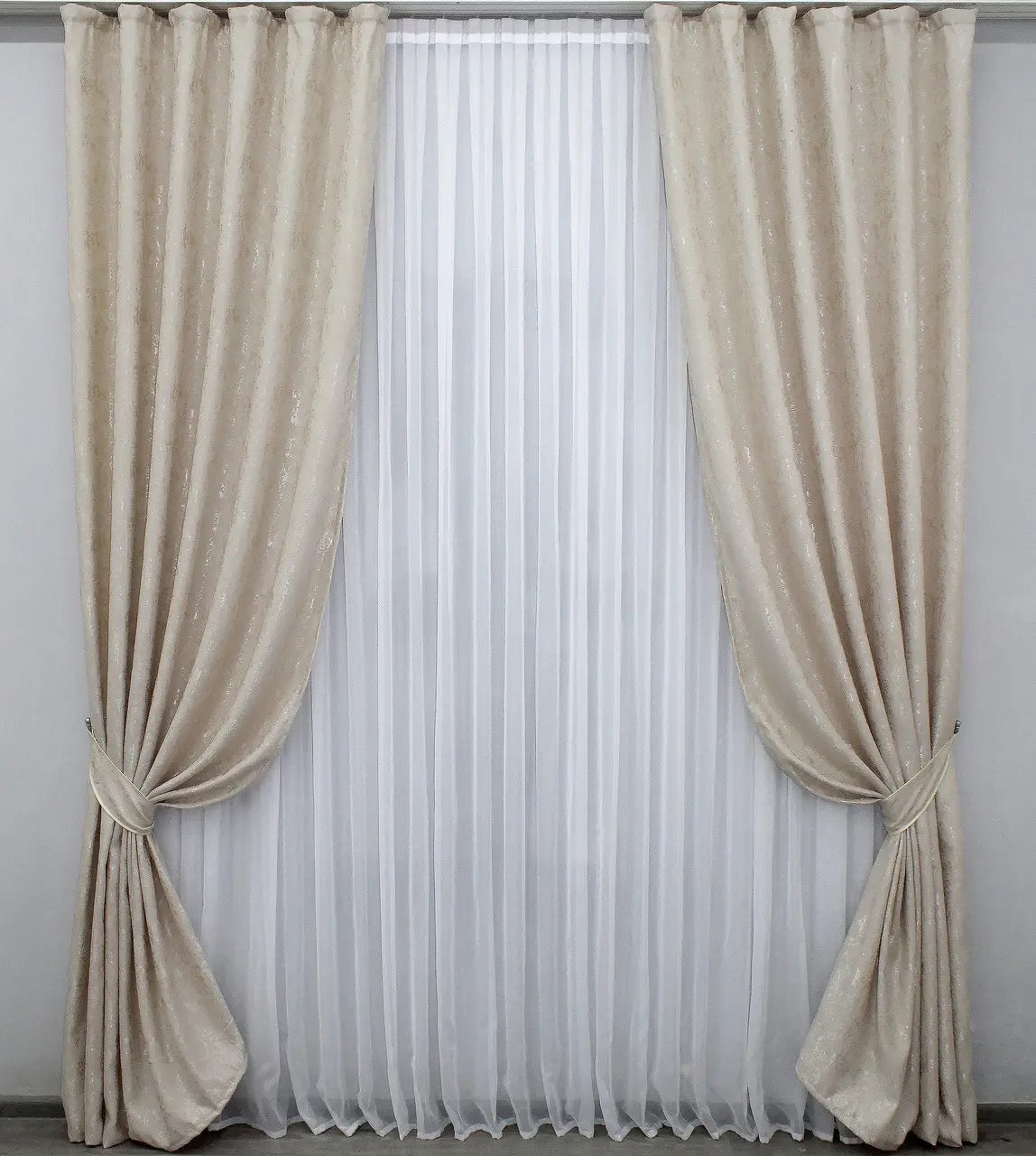 Soft light beige linen drapes with a delicate marble texture, perfect for sophisticated and stylish home decor.
