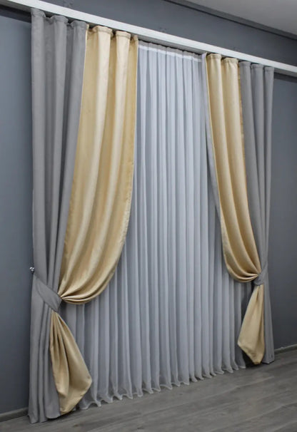 Elegant two-tone light grey and beige linen blackout curtains with excellent light-blocking capabilities, perfect for modern living spaces.
