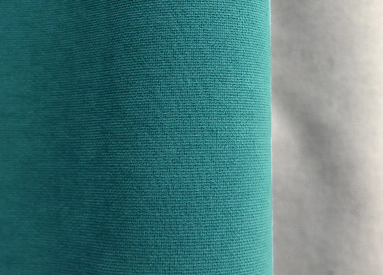 Refined two-tone turquoise and light grey microvelvet curtains from the "Sparta" collection, designed to bring modern elegance and cozy privacy.
