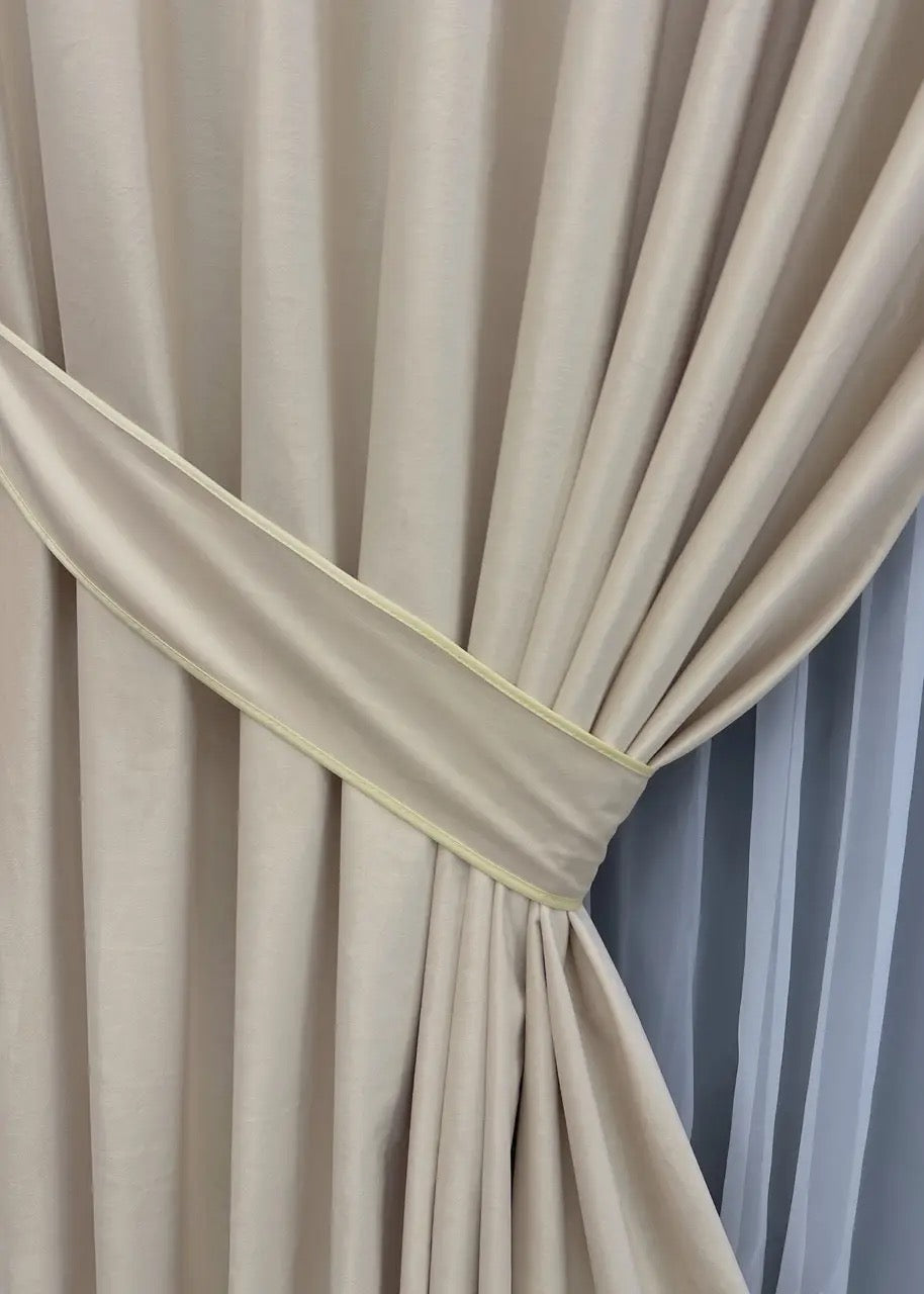 Soft oatmeal velvet curtain panels, featuring noise-absorbing properties and a smooth finish.
