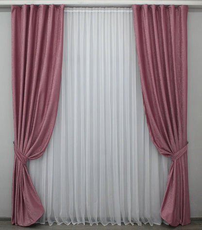 Elegant pink and gold velvet curtains with premium fabric and light-blocking features for creating a cozy and luxurious atmosphere.
