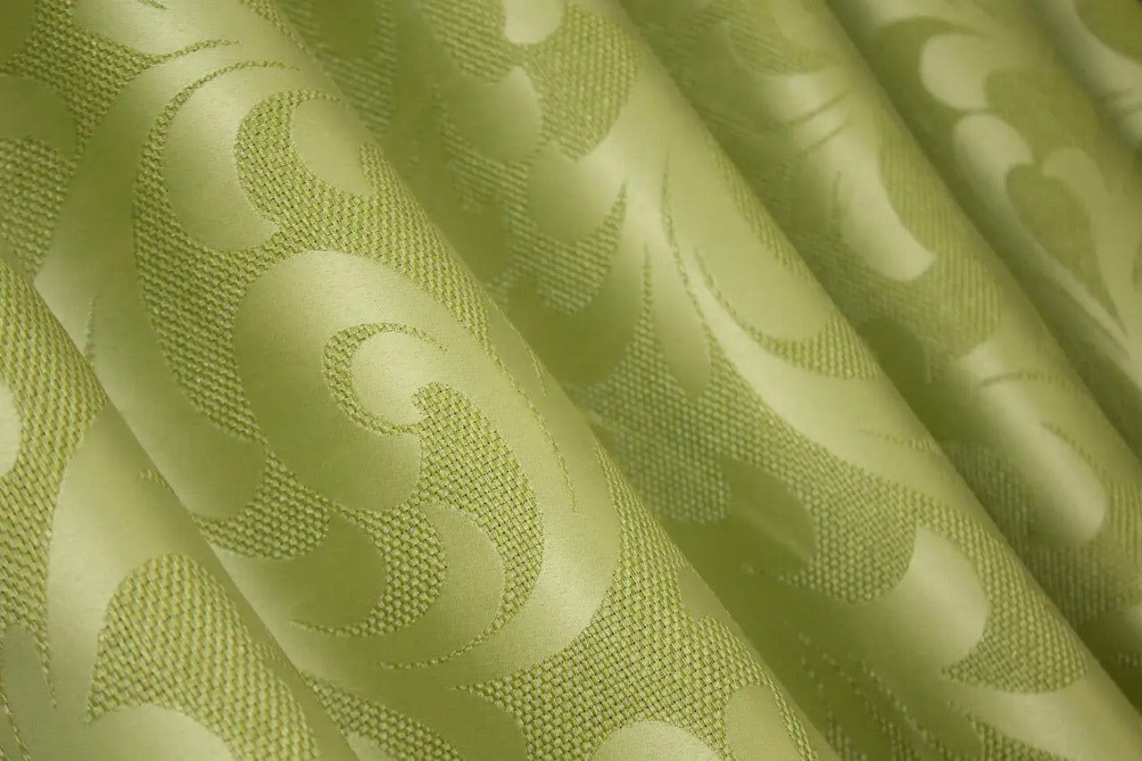 Soft-textured olive green Venzel drapes with a subtle embossed finish, enhancing cosy interiors.
