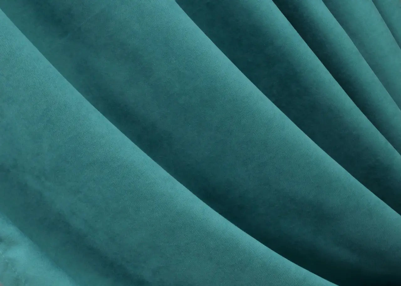 Soft-touch mint blue velvet curtains with a rich texture, perfect for home and hotel settings.
