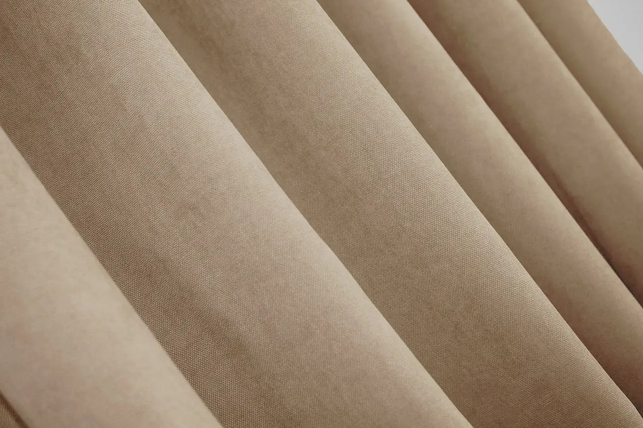 High-quality beige microvelvet curtains with a subtle sheen and refined elegance.
