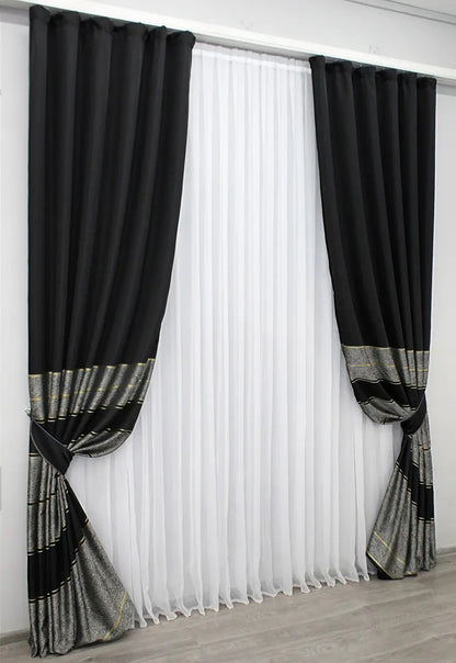 Sophisticated charcoal grey curtains with refined gold detailing, ideal for stylish living rooms.
