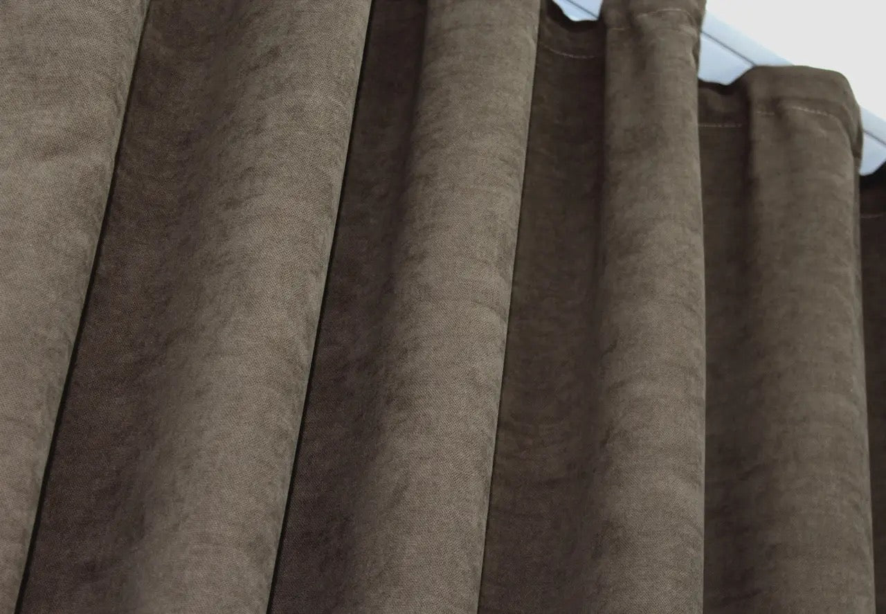 Soft-touch brown curtains with an elegant sheen, designed for refined home and office spaces.
