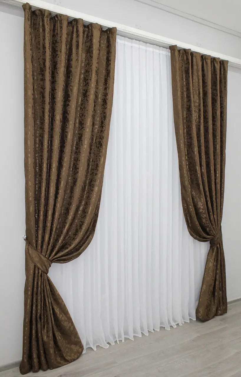 Light-filtering brown linen curtains with a soft finish, creating a warm and inviting atmosphere.
