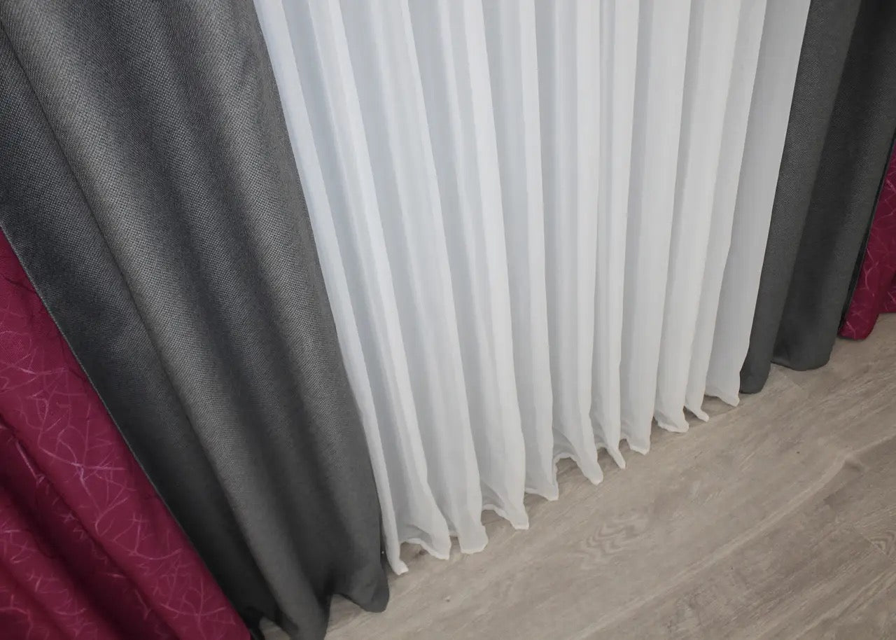 Sophisticated burgundy and grey linen combined curtains, ideal for creating a comfortable and stylish home office or living room.
