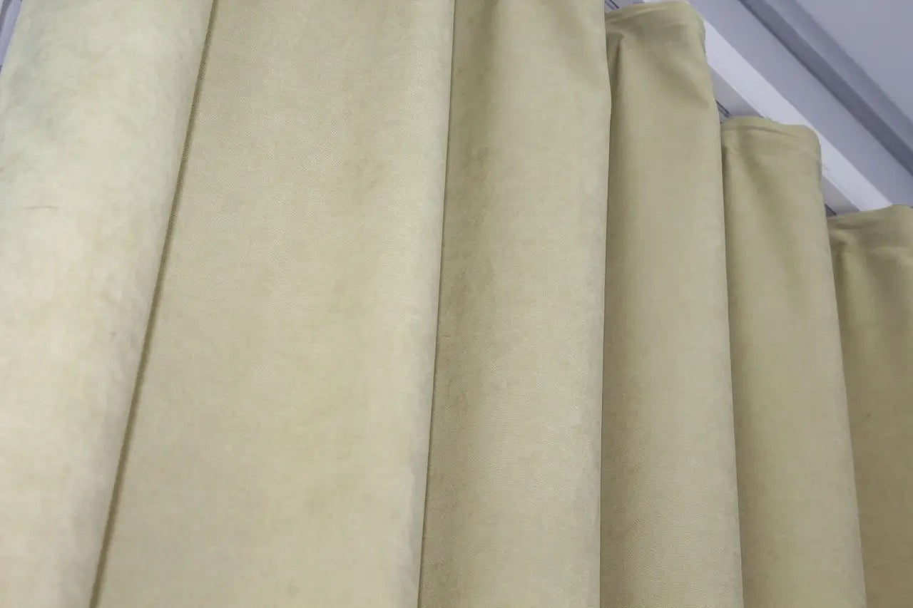 High-quality cream microvelvet curtains with a subtle sheen and refined elegance.
