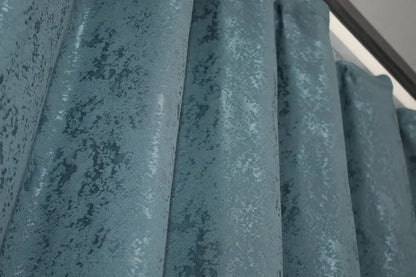 High-end linen curtains in azure, designed to complement neutral and bold interior styles.
