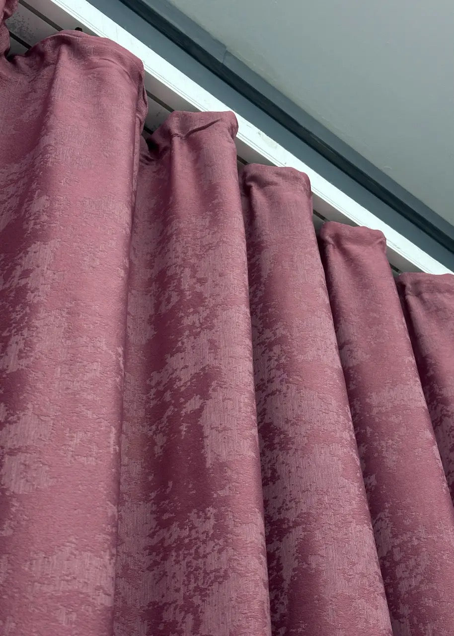 Luxurious dusty berry curtains with intricate jacquard textures, blending seamlessly into elegant and contemporary décor.
