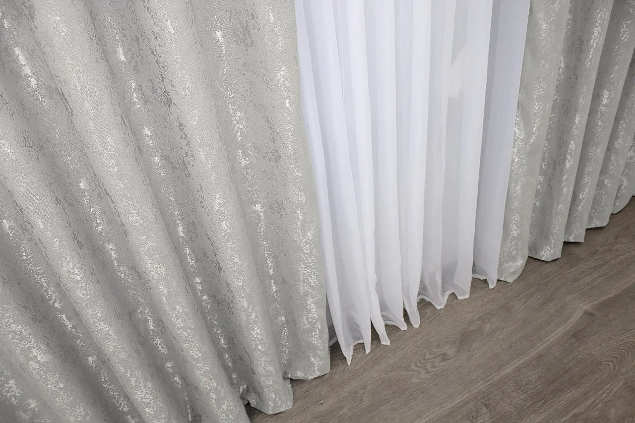 Contemporary silver linen curtains with a smooth finish, perfect for sleek and sophisticated home decor.
