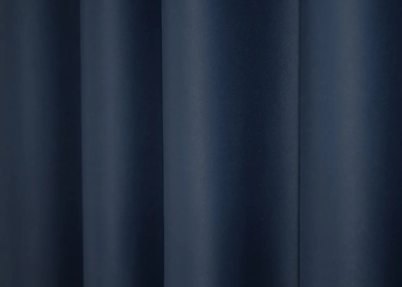 Stormy blue blackout curtains that enhance privacy while adding depth to interiors.
