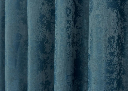 Opulent azure blue curtains with a textured jacquard design, bringing brightness and elegance to your home décor.
