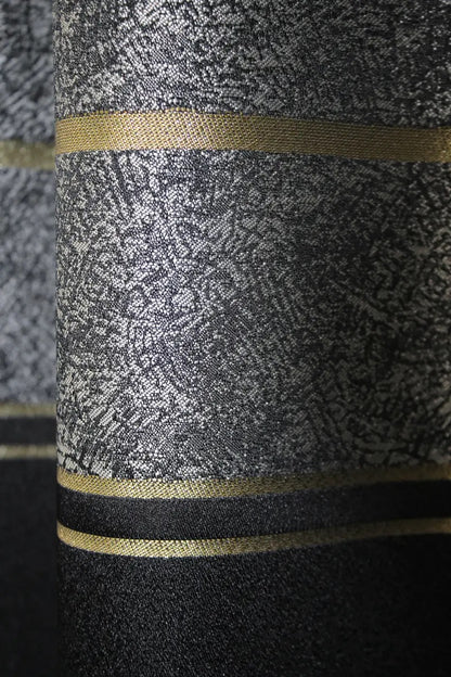 High-end linen curtains in black-grey with gold accents, designed for upscale home interiors.
