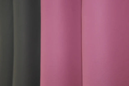 Dark grey (graphite) and mulberry (raspberry, fuchsia) combined blackout curtains featuring a bold yet refined contrast for luxury interiors.
