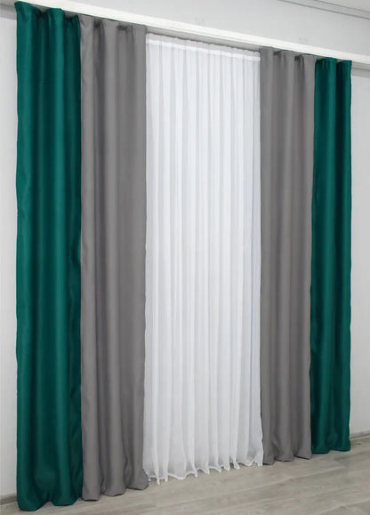 Emerald and grey combined blackout curtains featuring a bold yet refined contrast for luxury interiors.
