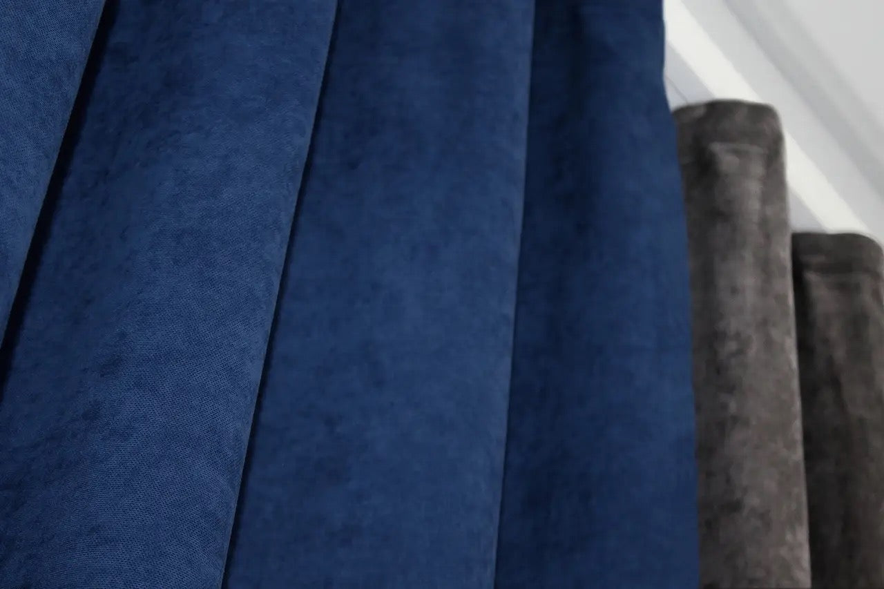 Dark cocoa and navy combined microvelvet curtains featuring a bold yet refined contrast for luxury interiors.
