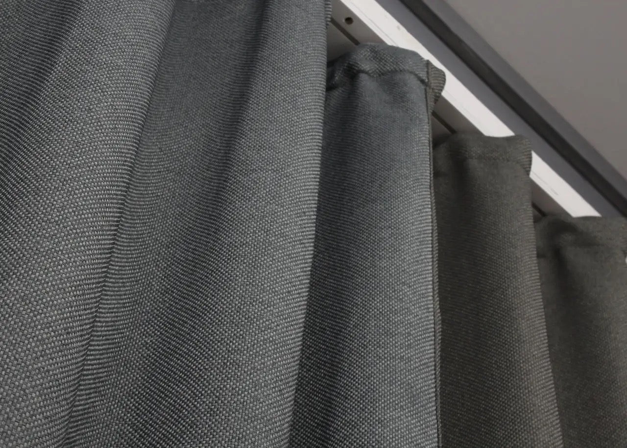 Stylish grey two-tone linen blackout curtains offering a perfect blend of aesthetics and practical light-blocking properties.
