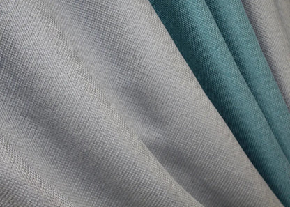 Light grey and turquoise combined linen curtains, offering an airy and modern look with a subtle yet refined contrast, ideal for living rooms and bedrooms.
