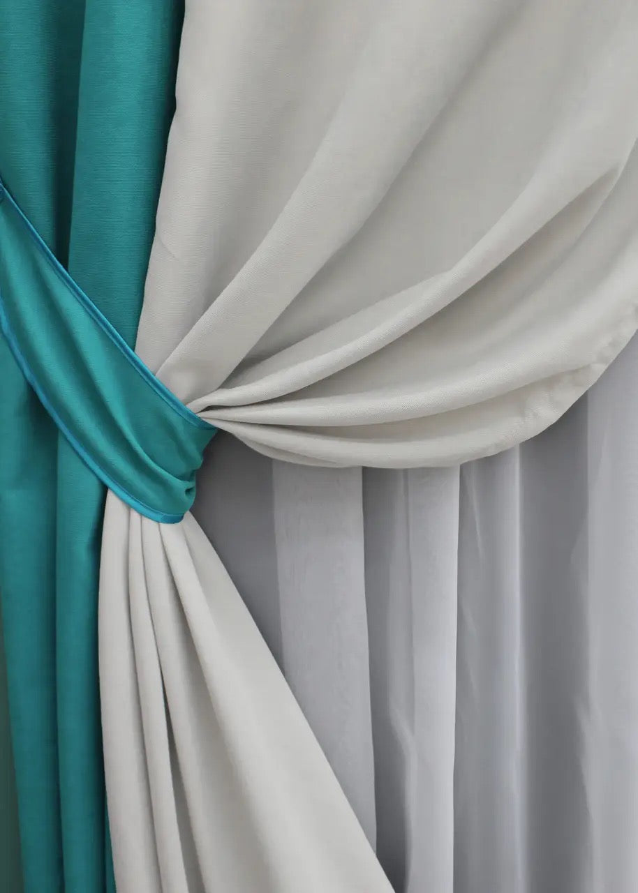 Chic turquoise and light grey combined microvelvet curtains, offering soft luxury and excellent light blocking for a sophisticated atmosphere.
