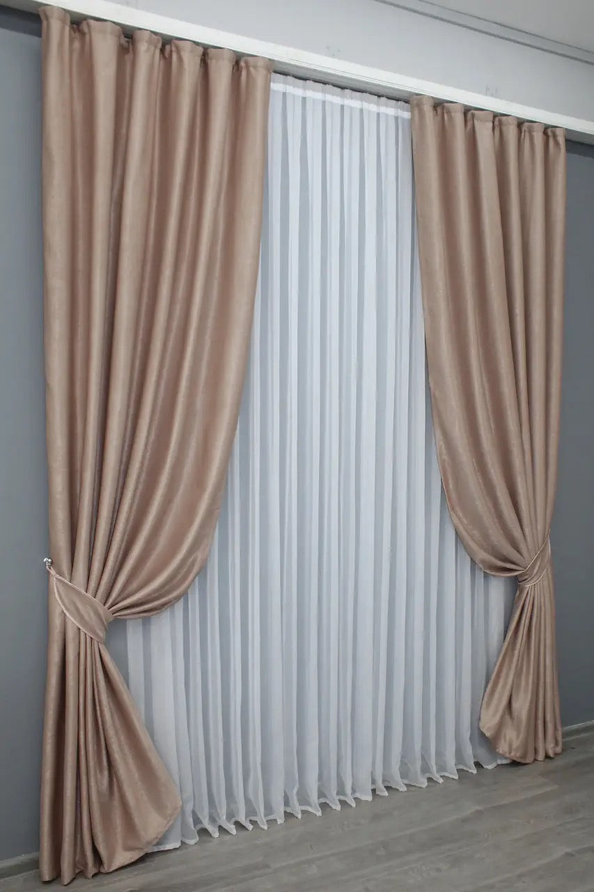 Taupe blackout velvet curtains with a premium soft-touch finish, ideal for modern and classic interiors.
