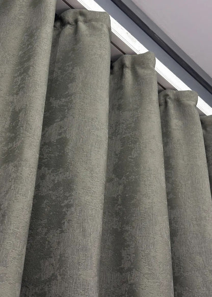 Textured graphite grey jacquard curtains, featuring a classic pattern that complements both modern and traditional interiors.