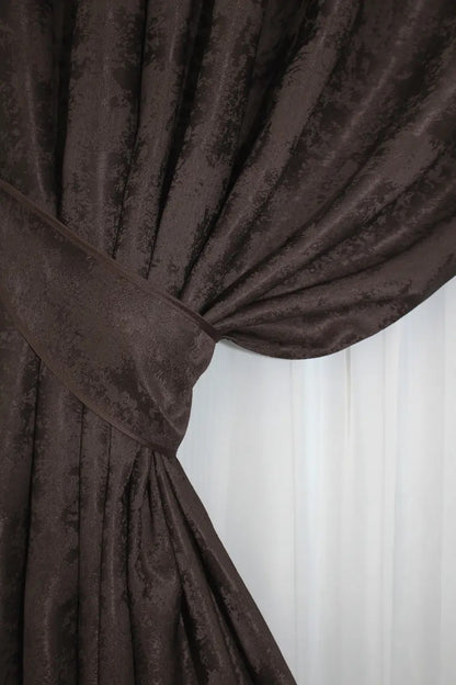 Textured wenge jacquard curtains, featuring a timeless pattern that complements both modern and traditional interiors.
