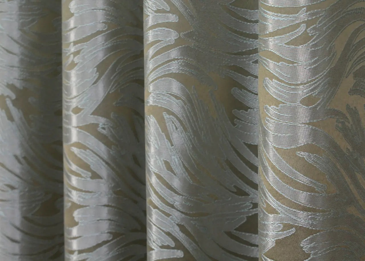 Breathable and soft jacquard curtains in sand-grey hues, creating a warm and inviting atmosphere
