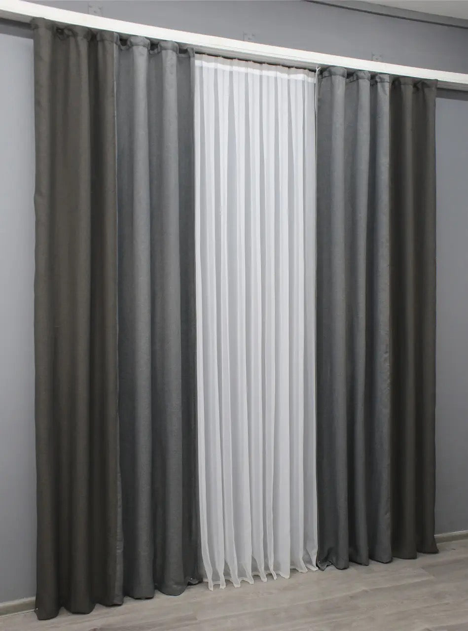 Two-tone grey linen blackout curtains that enhance any interior, with the perfect balance of style and functionality for contemporary living.
