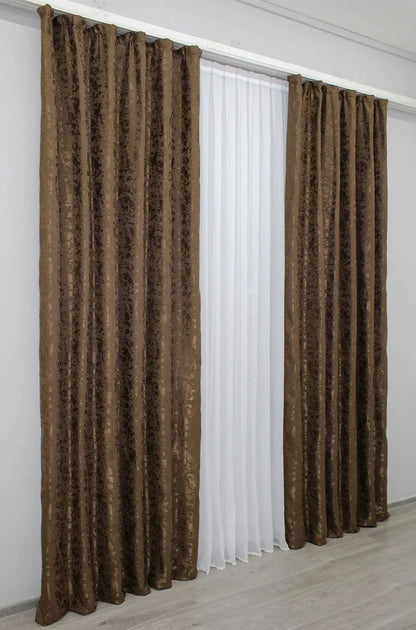 Luxury brown linen curtains with a smooth and refined finish, ideal for creating a cosy and intimate ambience.
