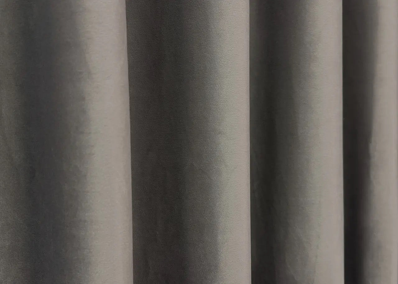 Urban grey velvet blackout curtains with a high-quality plush finish, designed to complement modern, classic, and industrial-style interiors.
