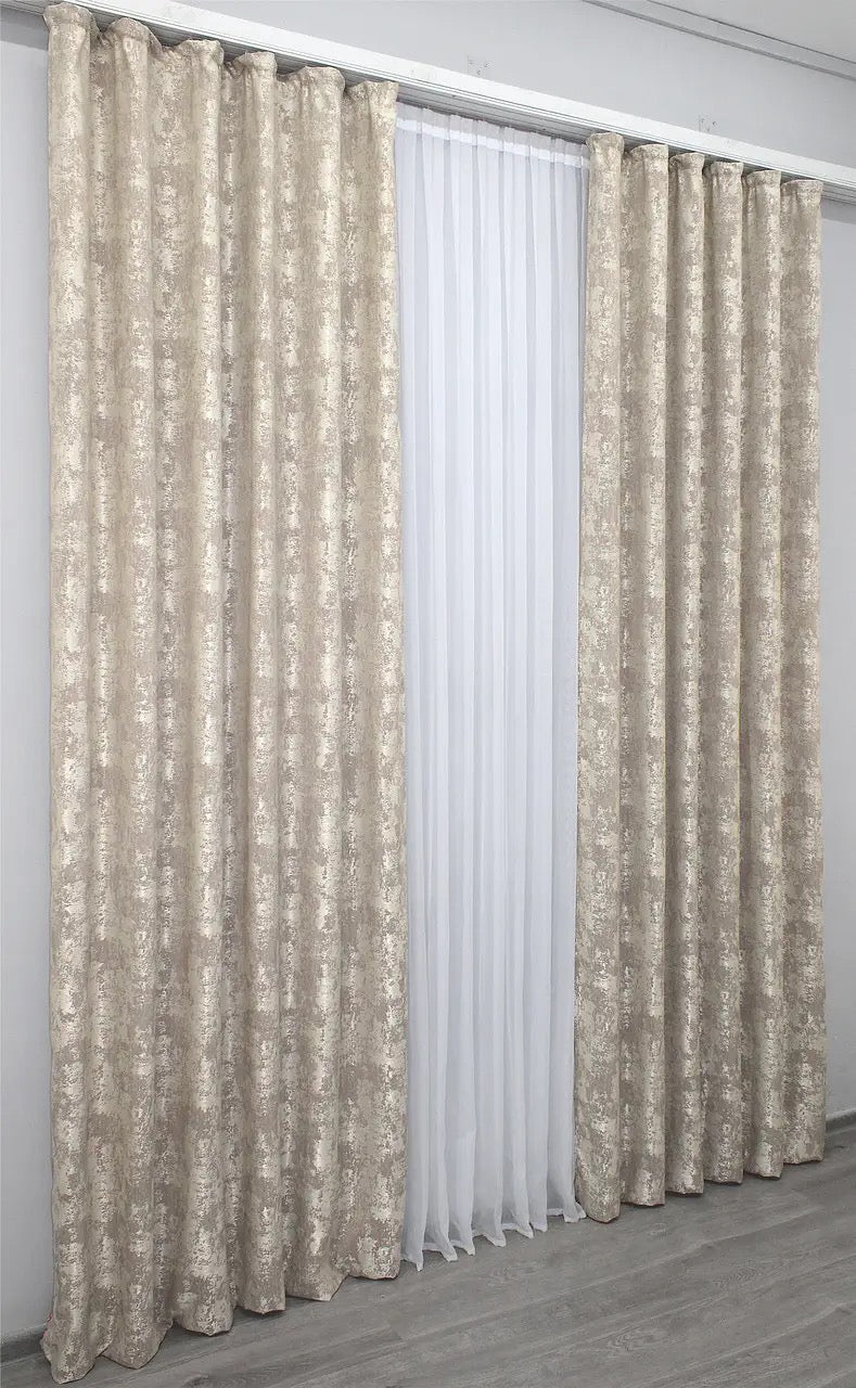 Versatile grey-beige curtains with a sophisticated neutral tone, blending seamlessly into contemporary and classic interior designs.
