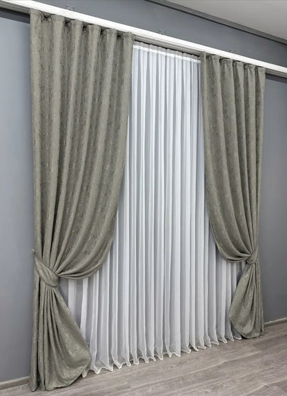 Soft-textured grey linen curtains designed to complement neutral, minimalist, and contemporary home décors.
