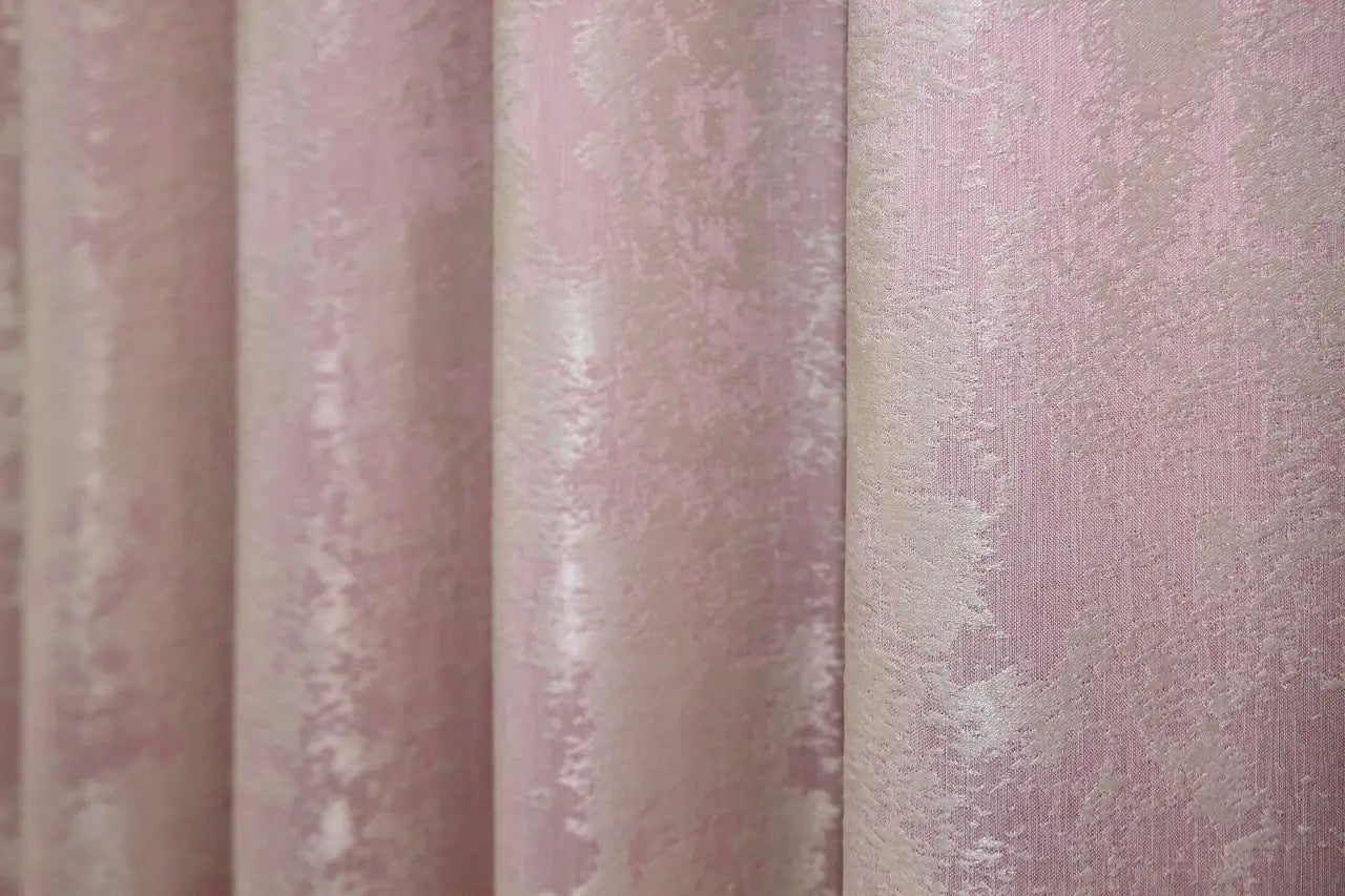 Versatile pale pink curtains with a neutral tone, seamlessly blending into any room’s color scheme.
