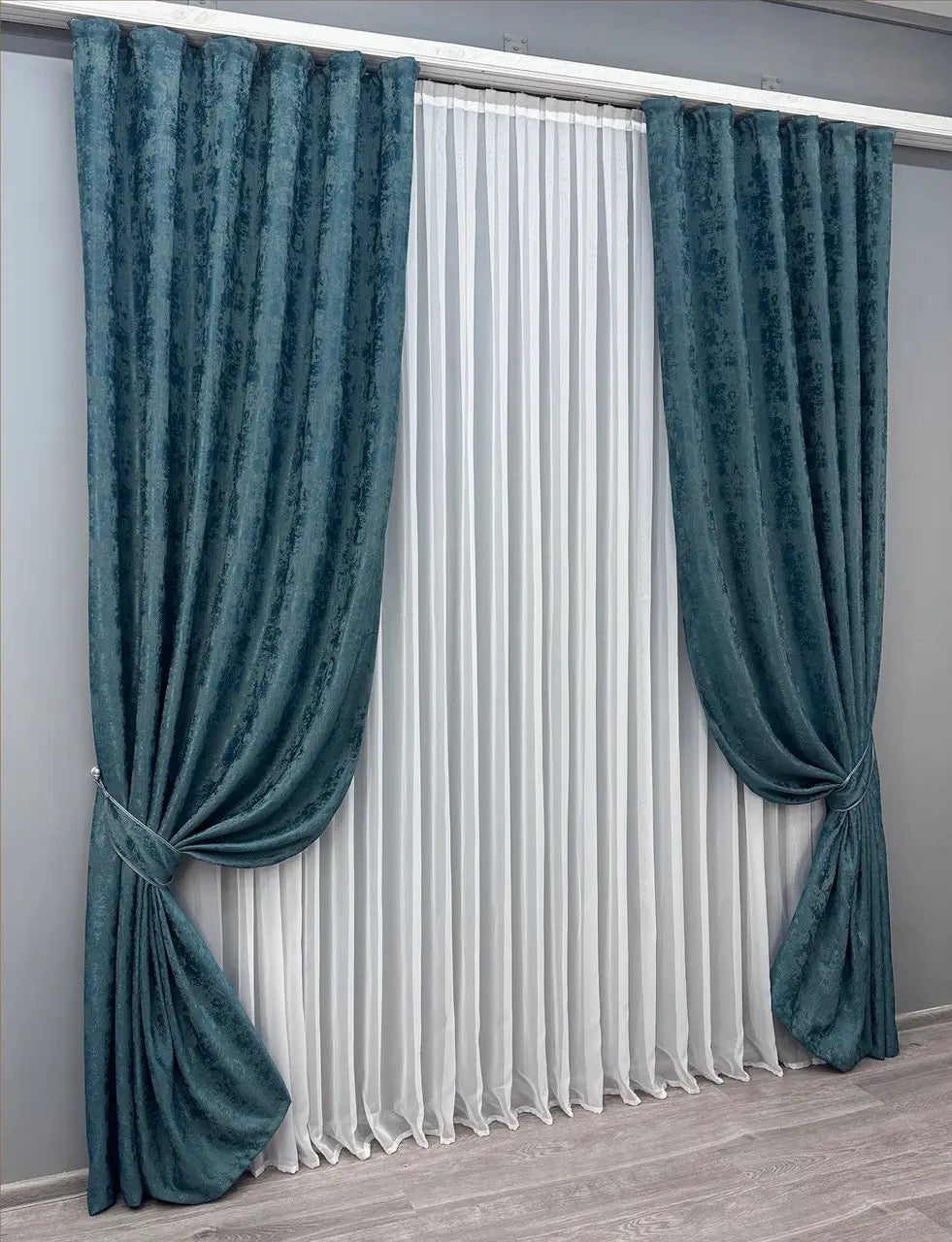 Stylish azure blue curtains designed with a bright, chic tone, ideal for modern and classic interior styles.
