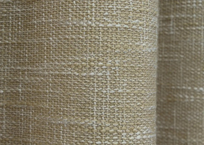 Warm beige coarse-woven linen curtains, designed to add depth and texture to elegant living spaces.
