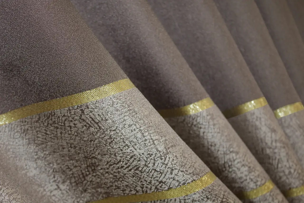 Stylish warm cappuccino linen curtains with a soft gold stripe, offering a cosy and luxurious feel.
