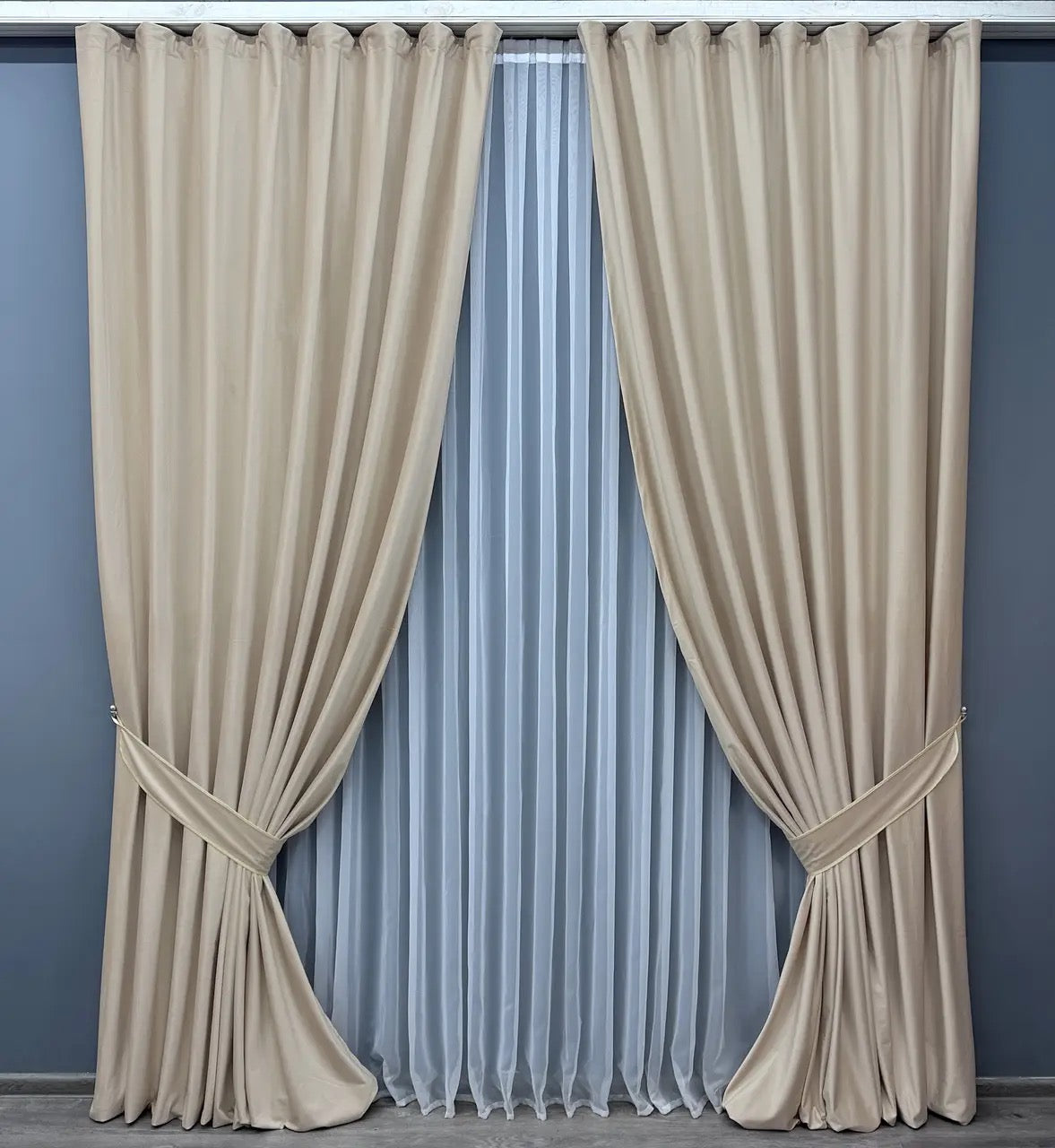 Warm ivory velvet drapes with premium-quality fabric, ideal for modern and classic interiors.
